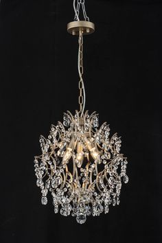 a crystal chandelier hanging from a ceiling