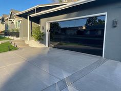 a house with a large garage door in front of it