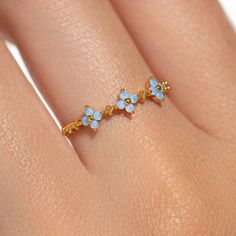 Take beauty everywhere you go when you wear the Blue Blossom Love Ring. With clusters of baby blue stones, this ring will become a favorite in no time. Disney Rings, Blue Blossom, Pink Sparkles, Blue Stones, Necklace Chain Lengths, Wrap Rings, Brass Pendant, Love Ring, Blue Rings