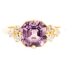 Crafted in 18 carat yellow gold, this enchanting contemporary art deco-inspired ring features a gorgeous 2.28 carat Asscher cut purple spinel raised in a four claw setting and flanked by six shimmering round brilliant diamonds. We have named this jewellery splendour The Isadora Ring. She is the quintessential adornment for marking momentous life occasion. The Isadora Ring Gemstone Details The Asscher cut spinel is 2.28 carats, measures 7.56x7.51x4.81 millimetres, and is a bright light pinkish pu Luxury Amethyst Ring With Rose Cut Diamonds, Pinkish Purple, Purple Colour, Claw Setting, Purple Art, Asscher Cut, Jewel Box, The Jewel, Victorian Jewelry