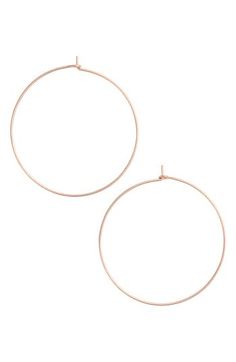 Dress up your everyday look with these delicate hoop earrings featuring a slim silhouette. 1 3/4" diameter Snap-post closure 14k-gold or sterling silver Made in the USA Chic Small Hoop Rose Gold Earrings, Chic Rose Gold Hoop Earrings, Chic Rose Gold Round Hoop Earrings, Chic Rose Gold Hoop Earrings For Everyday, Chic Everyday Rose Gold Hoop Earrings, Adjustable Rose Gold Hoop Earrings, Dainty Small Hoop Earrings In Rose Gold, Nickel-free Rose Gold Hoop Earrings, Small Hoop Earrings In Rose Gold