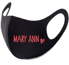 a black mask with the word mary ann on it's face and red lettering