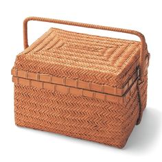 a large woven basket with handles on the top and bottom, sitting in front of a white background