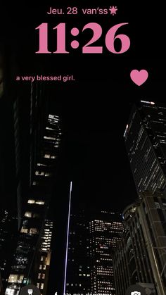 the new york city skyline is lit up at night with pink hearts in the sky