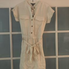 Never Worn Dress With Tags. Classic Button Down Waist Tie Dress With Pockets. Great Neutral Color And Easy Fit. Accepting Offers. Fit S/M Cream Buttoned Dress For Beach, Fitted Beige Shirt Dress For Beach, Fitted Beige Shirt Dress For The Beach, Casual Cream Mini Dress, Casual Cream Midi Dress For Day Out, Casual Cream Dress With Buttons, Casual Cream Shirt Dress For Daywear, Casual Beige Shirt Dress For The Beach, Cream Buttoned Dress For Work