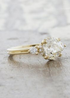 an engagement ring with two diamonds on it