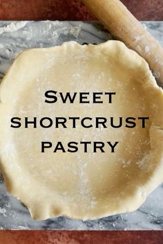 the words sweet shortcrust pastry are in front of a pie crust on a baking sheet