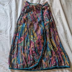 Excellent Condition Two Hidden Pockets Tags: Vintage, Colorful, Winter Seasonal Color Palette Multicolor Lined Wrap Skirt, Multicolor Long Lined Wrap Skirt, Multicolor Mini Wrap Skirt For Spring, Flowy Multicolor Lined Wrap Skirt, Casual Multicolor Wrap Skirt For Beach, Multicolor Mini Wrap Skirt For Summer, Summer Multicolor Mini Wrap Skirt, Multicolor Wrap Skirt For Summer, Casual Multicolor Lined Wrap Skirt