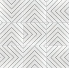 a white tile wall with grey lines in the shape of zigzagons