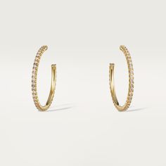 Cartier - Etincelle de Cartier earrings - Earrings Woman Gold/Diamond - Etincelle de Cartier hoop earrings, medium model, yellow gold (750/1000), each set with 37 brilliant-cut diamonds totaling 0.66 carats. Please note that the carat weight, number of stones and product dimensions will vary based on the size of the creation you order. For detailed information please contact us. Luxury Cartier Diamond Earrings, Elegant Cartier Diamond Earrings, Luxury 14k Gold Hoop Earrings For Formal Occasions, Classic Cartier Jewelry With Pave Setting, Cartier Yellow Gold Jewelry For Evening, Luxury Yellow Gold Hoop Earrings With Brilliant Cut, Luxury Yellow Gold Brilliant Cut Hoop Earrings, Formal Fine Jewelry Yellow Gold Hoop Earrings, Formal Yellow Gold Hoop Earrings