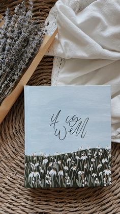 a wicker basket filled with lavender flowers and a card that says it's vegan