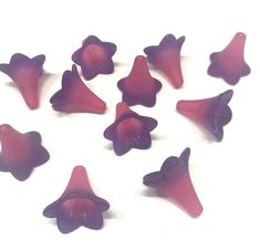 purple petals arranged in a circle on a white background