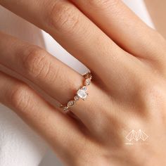 Diamond, which is the hardest material in the world formed centuries ago, has turned into a symbol showing the infinity and value of love over the years. We carefully design these jewels that you will wear as a symbol of the eternity of your love. 🔻 Diamond ring will look amazing on your lover's finger! 🔻Engagement rings will bring luck to your new family! 🔻Promise Ring will connect lovers forever! 🔶 Total Carat: 0.40CT 🔶 Stone Pieces: 13 🔶 Main Stones Measurement: 0.25CT - 5X3MM 🔶 Edge Stones: ROUND: 0.15CT -1.40MM 🔶 Gold Carat: 14 K  🔶Silver 925 💌 Zircon Stone 📌Zircon is a stone that strengthens the mind and memory. 📌It opens the closed chakras of people and revitalizes the aura. 📌It provides easy sleep. It helps to keep people away from bad dreams and nightmares. 📌It has a Elegant Simple Crystal Ring For Anniversary, Elegant Rings With Simple Design For Anniversary, Elegant Anniversary Rings With Simple Design, Elegant Simple Crystal Ring For Wedding, Adjustable Simple Diamond Promise Ring, Adjustable Diamond Midi Rings For Anniversary, Stackable Open Rings With Simple Design For Anniversary, Fine Jewelry Midi Anniversary Ring, Fine Jewelry Midi Ring For Anniversary