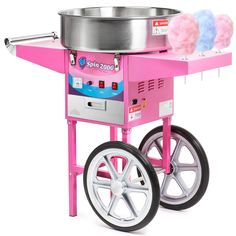 a pink cotton candy machine on wheels