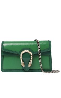 Gucci's iconic Dionysus shoulder bag is scaled down to 'super mini' proportions. This tonal green iteration is punctuated with the brand's signature Tiger's Head motif at the centre.Grained leather in green. Burnished edges in black throughout. Detachable curb chain shoulder strap with toggle fastening. Signature hardware at face. Foldover flap with press-stud fastening. Logo embossed at interior. Microsuede lining in beige. Antiqued silver-tone hardware. Height: 3.9"/10cm, Depth: 2"/5cm, Width: 6.7"/17cm Max. Strap Length: 47.2"/120cm Supplier color: EmeraldComposition: Leather.Made ın Italy Gucci Dionysus Super Mini, Tiger Head, Prada Crossbody, Signature Hardware, Prada Crossbody Bag, Mini Shoulder Bag, Curb Chain, Green Bag, Gucci Dionysus