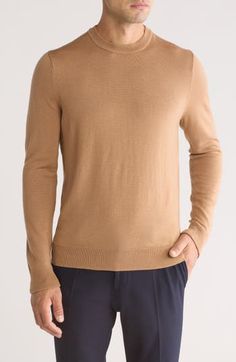 The only thing more wonderful than a smooth and polished-looking merino wool sweater is the fact that it's washable—your life just got easier! 26 1/2" length (size Medium) Crewneck Ribbed cuffs and hem 100% merino wool Machine wash, dry flat Imported Men's Clothing Solid Wool Sweater For Everyday, Everyday Solid Wool Sweater, Solid Merino Wool Sweater For Work, Classic Stretch Brown Sweater, Casual Merino Wool Crew Neck Sweater, Modern Merino Wool Crew Neck Sweater, Brown Merino Wool Crew Neck Sweater, Luxury Merino Wool Crew Neck Sweater, Mens Sweaters L.l.bean