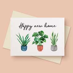 a card with three potted plants and the words happy new home written on it