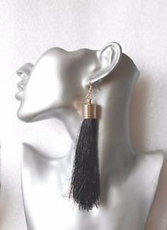 These earrings are created with luxuriantly thick tassels.  They measure 5" long.  All my earrings are available in pierced and clip-on format. Chic Evening Earrings With Tassels, Dangle Tassel Earrings For Evening, Long Drop Fringe Tassel Earrings, Long Tassel Earrings, Tassel Earrings, Jewelry Earrings Dangle, Etsy Earrings, Dangle Drop Earrings, Tassels