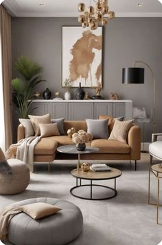 a living room filled with furniture and a chandelier hanging above the couches