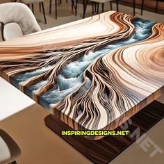 the table is made out of wood and has waves painted on it