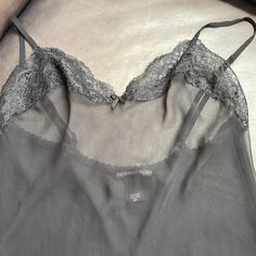 Never Worn, Sexy Sheer Lace Cami. Elegant Sheer Camisole For Night Out, Chic Underwire Camisole For Night Out, Elegant Black Bra-friendly Camisole, Fitted Sheer Camisole For Night Out, Date Night Camisole With Built-in Bra, Elegant Sheer Tops For Loungewear, Elegant Black Underwire Camisole, Elegant Victoria's Secret Camisole, Elegant Underwire Camisole For Night Out