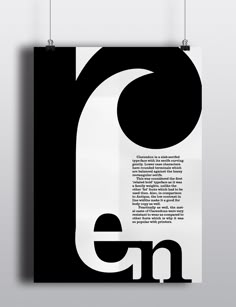 a black and white poster with the letter e in it's center, hanging on a wall