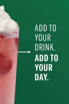 a pink drink with whipped cream on top