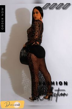 a woman is posing in a black dress with fishnet on the bottom and side