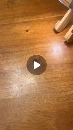 a wooden floor with a hole in the middle