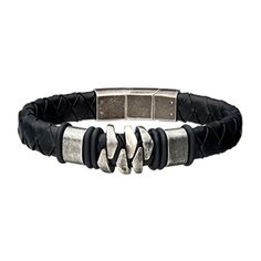 The Men's Stainless Steel and Gun Metal Black Leather Bohemian Bracelet from INOX features a black braided leather band with a metallic clasp. The centerpiece boasts three interlocking silver segments flanked by black rubber rings, exuding a rugged and masculine design. Modern Bracelet, Bracelet Styles, Modern Bracelets, Bohemian Bracelets, Jewelry Packaging, Daily Look, Edgy Fashion, Stainless Steel Bracelet, Fashion Bracelets