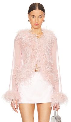 Find BUBISH Gigi Feather Blouse on Editorialist. Bubish Gigi Feather Blouse in Blush. - size 10/M (also in 8/S) Bubish Gigi Feather Blouse in Blush. - size 10/M (also in 8/S) Self: 100% polyester Contrast Fabric: 100% real dyed ostrich feather. Made in China. Hand wash. Front hook and eye closure. Chiffon fabric with feather trim. BUBR-WS12. GIGI. bubish is sophisticated. bubish is timeless. bubish is sustainable. The bubish range is diverse and thoughtfully designed to ensure every woman feels sophisticated, elegant and confident in their special piece. With varied styles, cuts and colors, they want bubish customers to be and look unapologetically themselves. Quality is integral, and their beautiful pieces are made to last a life time, not just a season. Handcrafted with responsibly sourc Bday Brunch, Feather Blouse, Nyc Outfits, Evening Blouses, Feather Tops, Evening Tops, Feather Trim, Ostrich Feather, Dress Rental