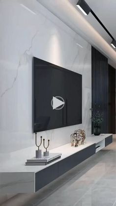 a large flat screen tv mounted to the side of a wall