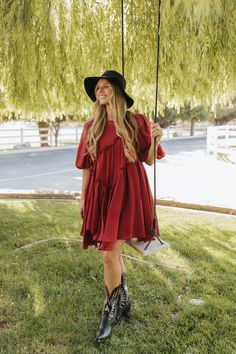 Introducing the Isabelle Asymmetrical Mini Dress in Berry - a fun and flirty addition to your wardrobe. Featuring an asymmetrical pattern, this flowy dress exudes a pretty and unique vibe. Designed in a beautiful berry red and a flattering babydoll style, it's the perfect dress for any occasion. Paired with THE CONTRAST COWBOY BOOTS IN BLACK Asymmetrical detail Puff Sleeve Button closure Mini length Lined Self 100% cotton, Lining 100% cotton Dress is true to size. Small (0-2), Medium (4-6), Larg Happy Threads, Asymmetrical Pattern, Summer Goddess, Pink Desert, Babydoll Style, Exclusive Clothing, Nursing Friendly, Flowy Dress, Swim Bottoms