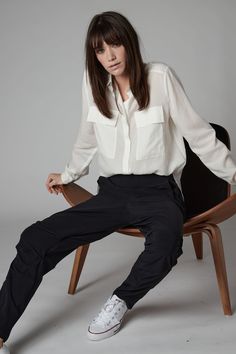 Ruti's On The Loose Work Pants are laid-back chic, uber comfortable and endlessly versatile. The ultra-flattering tapered leg design make for our favorite pant silhouette. Chic Relaxed Fit Cargo Pants For Work, Versatile Relaxed Fit Work Pants, Versatile Straight Cargo Pants For Workwear, Versatile Relaxed Fit Pants For Work, Versatile Loose Fit Harem Pants For Work, Chic Relaxed Fit Harem Pants For Work, Versatile Harem Pants For Work, Ankle-length, Versatile Harem Pants For Workwear, Loosely Fitted Harem Pants With Elastic Waistband For Work