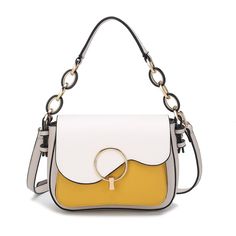 Introducing the MKF Collection Fantasia Solid Crossbody Bag by Mia K, a sleek and stylish accessory crafted from high-quality vegan leather with durable fabric lining. This designer crossbody bag is detailed with luxurious gold-tone hardware, a small turn-lock closure, a structured silhouette, and a flat bottom for added stability. Its compact yet spacious design is perfect for daily use, offering a blend of functionality and sophistication. Inside, the MKF Fantasia Crossbody Bag features roomy Designer Crossbody Bag, Designer Crossbody, Easy Organization, Designer Crossbody Bags, Crossbody Messenger Bag, Womens Crossbody Bag, Charcoal Color, Leather Care, Small Bag