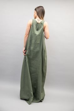 "Graceful, side draped with side hidden pockets, elegant and fancy, this dress is made of fine linen, it is easy to wear and perfect for formal events or casual occasions. Zero waste and high quality material, this garment brings comfort and a neat and stylish look. MATERIALS × linen 100% -------------------------------------------------- If you have any questions about the item or have any personal requirements about the garment, please do not hesitate to send us a message, our team is availabl Floor-length Summer Dresses For Daywear, Flowy Maxi Dress Unlined, Flowy Maxi Length Dress, Unlined Flowy Maxi Dress, Flowy Linen Dresses, Unlined, Flowy Linen Dresses Unlined, Linen Sundress In Maxi Length, Long Linen Dress For Daywear, Floor-length Linen Dress For The Beach