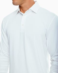 It doesn’t get any better than this – a classic long sleeve men's polo with all the performance features you love. Pair with our Gulf Shorts for the perfect preppy look. Style: 8431 Classic Fit Model is 6'1 wearing a size M 88% Polyester 12% Stretch Outline Skipjack heat seal on back neck Open chest and sleeve cuffs T3 tagless feel for comfort 2-piece self collar 3-button placket with white branded buttons Drop tail hem Soft and breathable fabric UV Protection Stretch for ease of movement Moistu Classic White Collared Polo Sweater, Classic Long Sleeve Golf Top, White Sporty Polo Sweater With Polo Collar, Sporty White Polo Sweater With Polo Collar, Classic Long Sleeve Solid Polo Shirt, Sporty White Long Sleeve Polo Sweater, Sporty White Polo Sweater, White Long Sleeve Golf Tops, Preppy Boys Outfits