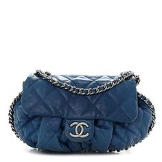 This is an authentic CHANEL Washed Lambskin Quilted Medium Chain Around Messenger in Blue. This shoulder bag is crafted of lambskin leather in blue. It features a leather threaded polished silver chain around the body of the bag, a silver Chanel CC with a magnet closure, and a long silver chain threaded with a leather shoulder strap. The flap opens to a beige fabric interior with a zipper pocket. 1403166 Luxury Blue Bag With Chain Detail, Luxury Blue Bags With Chain Detail, Luxury Blue Bags With Chain, Luxury Blue Chain Bags, Leather Thread, Beige Fabric, Lambskin Leather, Zipper Pocket, Silver Chain