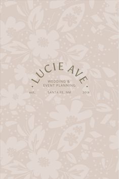 an elegant wedding program with flowers on the front and back cover, in light pink