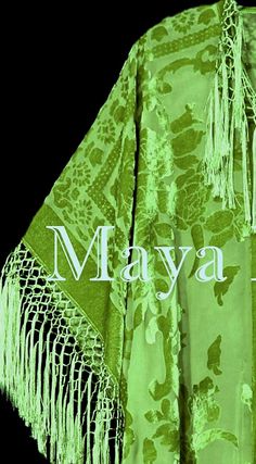 "DESCRIPTION : MADE IN USA BY MAYA Greenery Green fringe kimono burrnout velvet jacket opera coat Greenery - 2017 Fashion color of the year ! Cut in a Kimono style with hand knotted fringes down the front and around the hems Simply exquisite! You will not find this exact color anywhere , it is a hand dyed custom shade. As with all hand dyed fabrics each one is unique, but you will get a Light Olive Green the same or very close to the one in the photos Can be worn with many outfits One size Fits Velvet Duster, Velvet Fringe, Opera Coat, Light Olive Green, Fringe Kimono, Burnout Velvet, Kimono Duster, Custom Shades, Hand Dyed Fabric