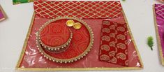 "For bulk purchase, pls ping us . *Ready to Dispatch* MIX COLORS and SPECIFIC COLOR WE NEED 5-6 DAYS TIME TO PREPARE THEM  Beautiful Handmade decorated Steel multi purpose plate and mithai box. These can be used as decorative plates or for Rakhi or Aarthi or for Puja or even to give as a return gift. They come in many variety of colors. There are various options to chose from. Adorned with white pearls lace. https://www.etsy.com/in-en/shop/Indiancraftskhushi?ref=seller-platform-mcnav&section_id= Navratri Puja, Mithai Boxes, Wedding Giveaways, Punjabi Wedding, Pearl And Lace, Wedding Favours, Silk Fabric, Pearl Beads, Pearl White