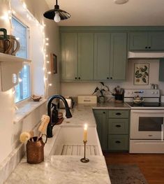 a kitchen filled with lots of counter top space next to a stove top oven and microwave