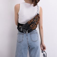 Try this phone pouch to complement your trendy outfit at parties. The synthetic material pouch designed with an animal print pattern and zipper sports a casual look. This waist bag is lightweight and has a solid exterior with an attractive color finish. Women would love this item for its unique hobo-style design.Specifications pattern: Animal Prints Style: Casual Shape: Hobos Place Of Origin: GUANG DONG Province Pattern Type: 200003704,200003704 Origin: Mainland China Occasion: Party Model Number: waist bag,waist bag Main Material: PU Lining Material: Cotton Interior: No Pocket Hardness: HARD Gender: WOMEN Exterior: Solid Bag Decoration: Other Closure Type: zipper CN: Guangdong Brand Name: GeraldBlack When purchasing clothing, shoes, and/or belts; please follow the size chart. Please click Casual Black Phone Bag With Zipper Pocket, Trendy Crossbody Phone Bag With Zipper Pouch, Trendy Black Phone Bag With Zipper Closure, Trendy Pouch Chest Bag With Zipper, Trendy Pouch Chest Bag With Zipper Closure, Trendy Mobile Phone Belt Bag, Trendy Pouch Chest Bag With Zipper Pocket, Trendy Chest Bag With Zipper Pocket, Trendy Pouch Phone Bag With Zipper Pocket