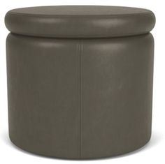 a round ottoman with a leather look finish