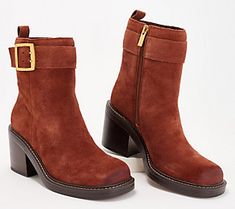 This sophisticated ankle boot is crafted of various leather and suede finishes accented with a leather band and a prominent buckle. Pair them with your wide leg jeans and a refined wool sweater for a polished look. From Vince Camuto. Winter Brown Moto Boots With Suede Lining, Formal Boots For Fall, Fall Moto Boots With Stacked Heel And Medium Width, Fall Moto Boots With Suede Lining And Round Toe, Trendy Suede Heeled Boots For Fall, Trendy Suede Boots For Fall, Modern Moto Boots With Reinforced Heel For Fall, Brown Moto Boots With Stacked Heel For Fall, Fall Ankle Moto Boots With Reinforced Heel