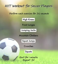 a soccer ball sitting on top of a lush green field next to the words hit workout for soccer players