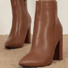 Elevate your style with these Classic Brown Chunky Heel Ankle Boots. Featuring a pointed toe and convenient zipper closure, these boots blend sophistication with everyday comfort effortlessly. Color: Brown Heel Type: Chunky heel Heel height: 4.72" / 120 mm approx Product measurements were taken using size 8. Please note that measurements may vary by size. Toe: Pointed toe Side zipper closure Handcrafted US sizing. Fits true to size. Trendy Brown Boots With Zipper Closure, Trendy Brown Boots With Zipper, Brown Pointed Toe Heeled Boots With Zipper, Brown Pointed Toe Heeled Boots With Zipper Closure, Trendy Platform Boots With Zipper And Pointed Toe, Trendy Pointed Toe Platform Boots With Zipper, Brown High Heel Boots With Zipper Closure, Trendy Brown Platform Boots With Zipper Closure, Trendy Brown Platform Boots With Zipper