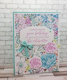 a handmade birthday card with flowers and words on the front, which reads i don't forget your birthday