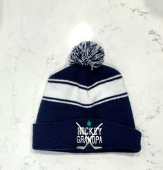 Perfect for your cold weather sport. Can be done in team colors. Please specify color and Last name or # to be applied. Don't miss the matching scarf. Bennies Hats, Hockey Hats, Hat Pom Pom, Cool Hat, Hockey Mom, Spirit Wear, Pom Pom Hat, Cool Hats, Skull Cap Beanie