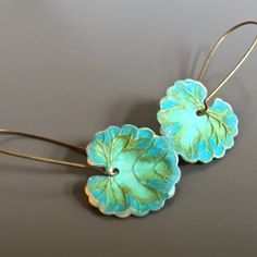 "Small Patina Leaf Earrings - Gorgeous Verdigris Leaves with Long Antiqued Brass Earwires. The fourth picture shows the back. It is not patina'd. Leaves are slightly 20mm (.75\") in diameter Earrings measure 1.75\" from top of earwire to bottom of leaf This is a stock photo. Patina varies slightly. Larger version of these earrings: https://www.etsy.com/listing/646432235/leaf-earrings-patina-jewelry-leaf?ref=shop_home_active_1&frs=1 Be sure to check out my Verdigris Collection for similar ite Handmade Green Leaf-shaped Earrings, Nature-inspired Green Jewelry With Matching Earrings, Green Artisan Pierced Earrings, Green Leaf-shaped Earrings For Pierced Ears, Handmade Green Leaf-shaped Jewelry, Nature-inspired Green Jewelry With Ear Wire, Bohemian Green Leaf-shaped Jewelry, Blue Leaf-shaped Jewelry For Gift, Blue Leaf-shaped Jewelry Gift